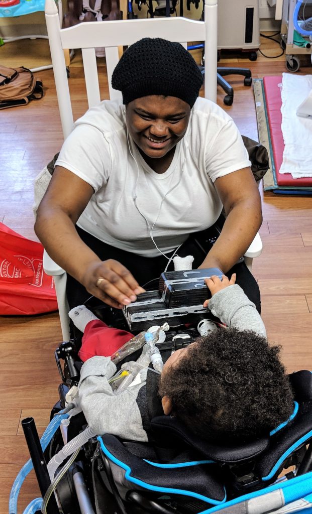 A child plays with a car